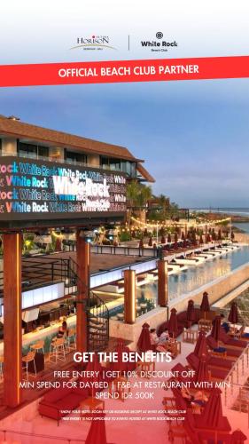 a flyer for a beach club with a pool and chairs at Horison Ultima Seminyak Bali - CHSE Certified in Seminyak