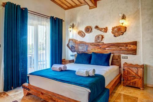 Una cama o camas en una habitación de Moonlight of Cappadocia