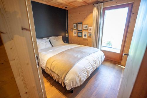 Cama o camas de una habitación en Alphütte Ried
