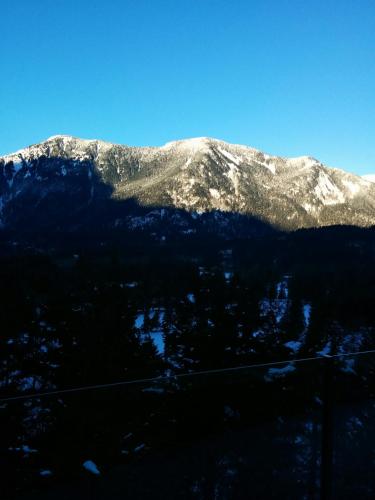 a view of a mountain with snow on it at High Hopes Bed and Breakfast in Hope