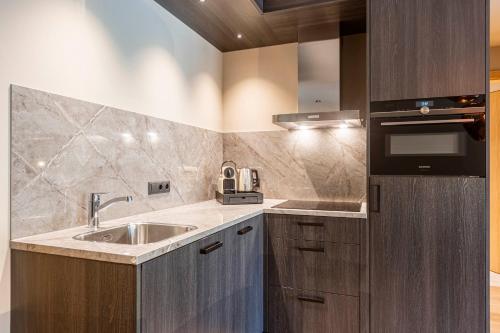 Una cocina o zona de cocina en Montafon Suites Schruns by ALPS RESORTS