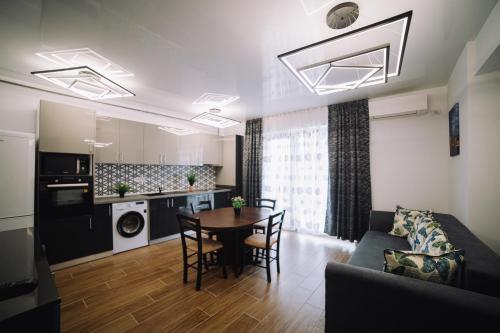 Η κουζίνα ή μικρή κουζίνα στο Signature Promenada Hotel-Apartments 2