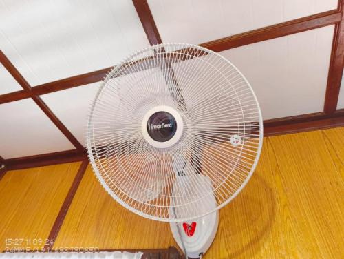 a white fan sitting on top of a ceiling at Tao Thong Villa 2 in Ko Tao