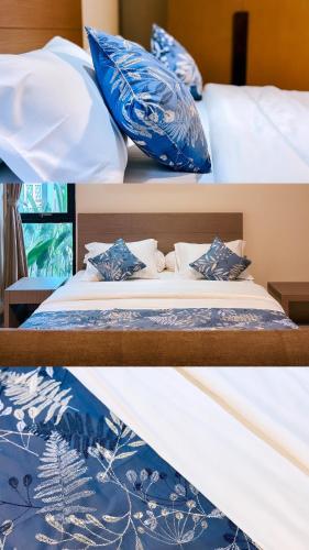 Ένα ή περισσότερα κρεβάτια σε δωμάτιο στο Nawasena Suites