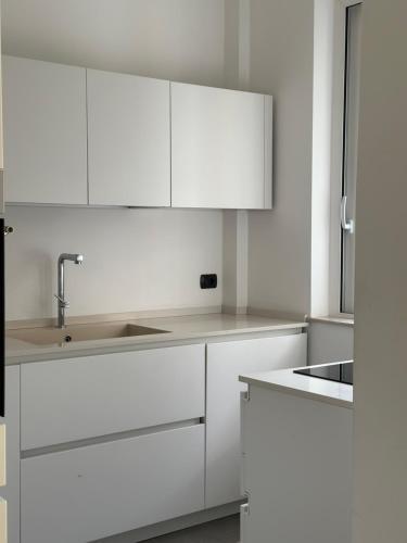 A kitchen or kitchenette at Villa Savoia Mondello