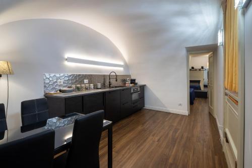 A kitchen or kitchenette at Le Piccole Lune di Monti