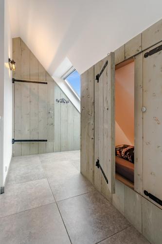 Ένα μπάνιο στο Luxury apartment in farmhouse near Amsterdam
