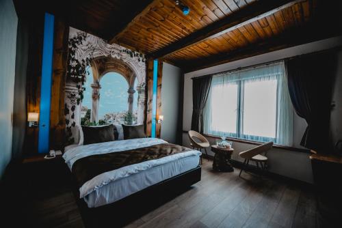 Postel nebo postele na pokoji v ubytování Kayı Resort Hotel