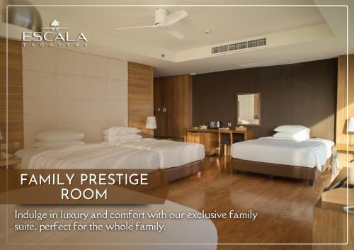 a hotel room with two beds and a room at Escala Tagaytay in Tagaytay