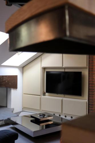 Kuchyň nebo kuchyňský kout v ubytování La Corte di Brusuglio Apartments