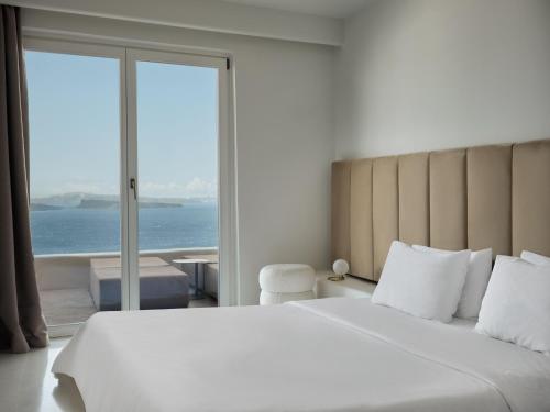 Postel nebo postele na pokoji v ubytování Andronis Boutique Hotel