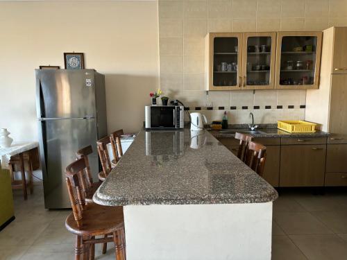 Η κουζίνα ή μικρή κουζίνα στο Penthouse in La Vista Bay