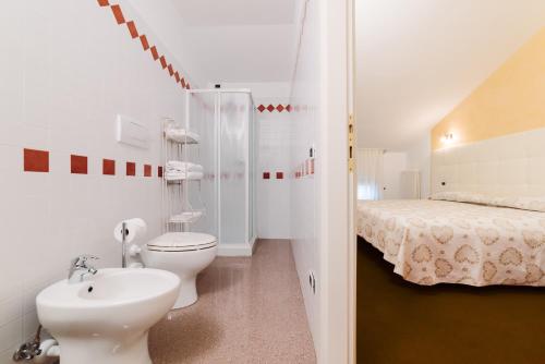 Koupelna v ubytování Hotel Roma