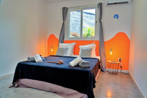 Voodi või voodid majutusasutuse Villa Bon manjé cosy, piscine privative & vue Mer toas