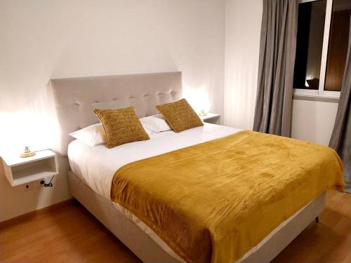 Postel nebo postele na pokoji v ubytování Sandie's Serene Stay