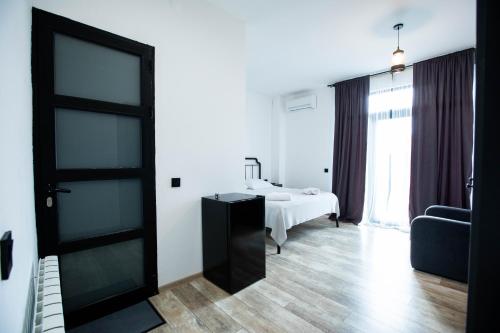 Postel nebo postele na pokoji v ubytování Level Up Hotel & Restaurant