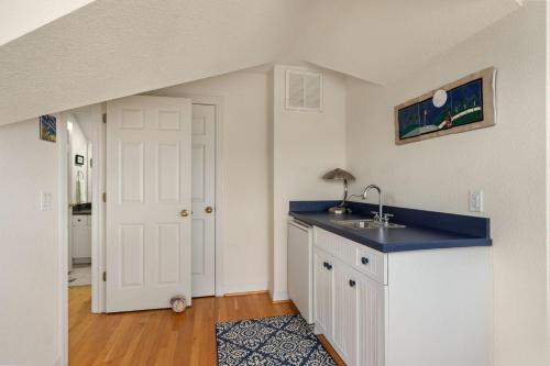 a kitchen with a sink and a counter top at CCHK70 Peace of Paradise in Corolla