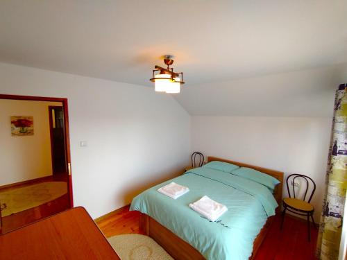 Postel nebo postele na pokoji v ubytování Boutique Casa Galbena