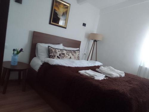 Postel nebo postele na pokoji v ubytování Verona Apartment