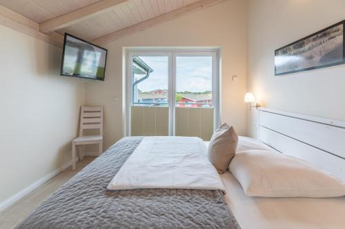 Postel nebo postele na pokoji v ubytování Wattenmeer