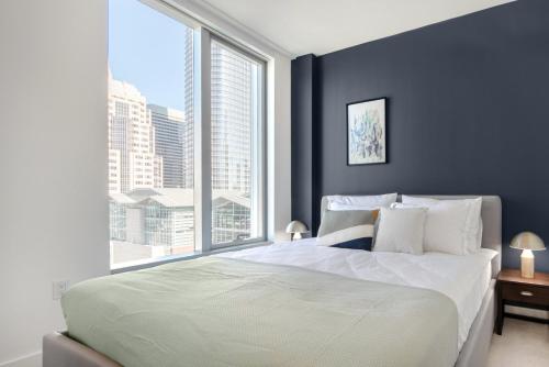 Ένα ή περισσότερα κρεβάτια σε δωμάτιο στο Rincon Hill 1BR w Gym Sauna nr SVB FB SFO-207