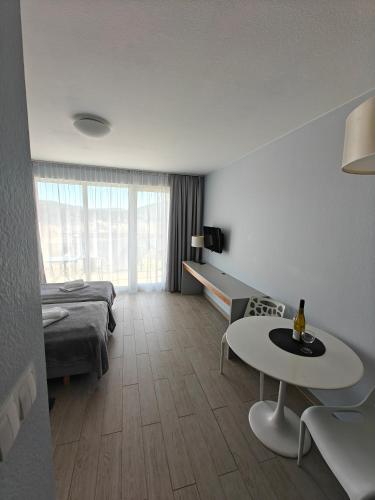 Ένα ή περισσότερα κρεβάτια σε δωμάτιο στο Apartament MERCURY