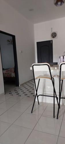 Μια τηλεόραση ή/και κέντρο ψυχαγωγίας στο D'Tanjung Homestay - Tulip