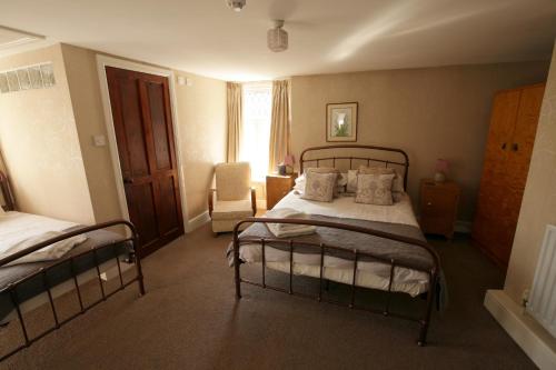 Cama o camas de una habitación en Fitzwarine House Whittington