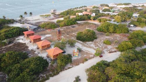 an aerial view of a resort on the beach at Canto do Mar - Atins - Lençóis Maranhenses in Atins