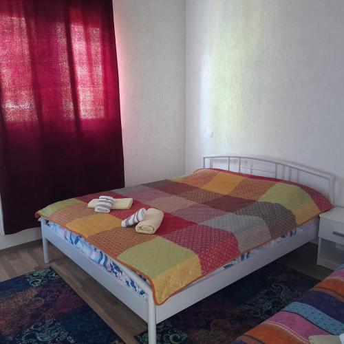 Postel nebo postele na pokoji v ubytování Green Paradise Villa