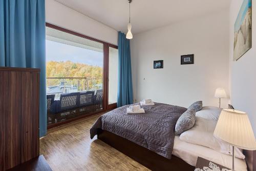 Postel nebo postele na pokoji v ubytování Apartamenty Świnoujście - Baltic Park