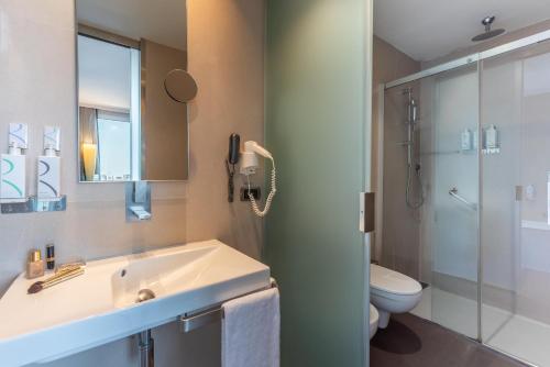 Et badeværelse på Best Western Premier Hotel Royal Santina