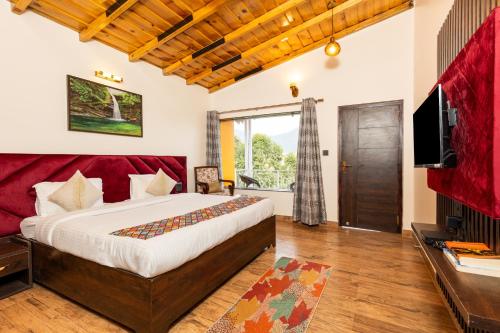 Postel nebo postele na pokoji v ubytování Aranya Mukteshwar