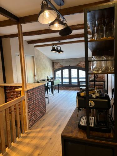 Kuchyň nebo kuchyňský kout v ubytování La Tannerie des Spaens