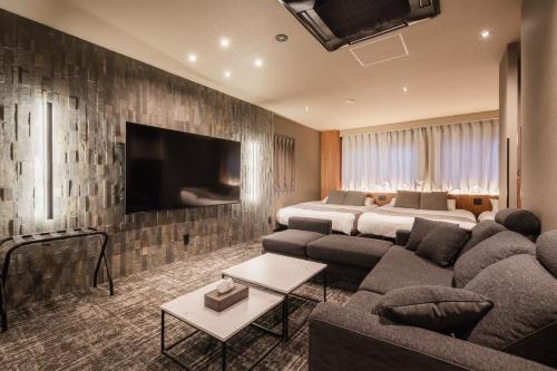 TV a/nebo společenská místnost v ubytování The LOFT INN HAKATA