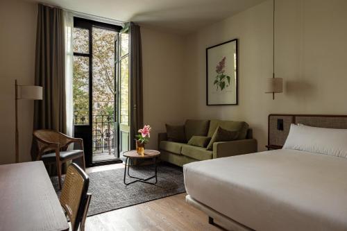 Postel nebo postele na pokoji v ubytování Batimont Suites & Apartments