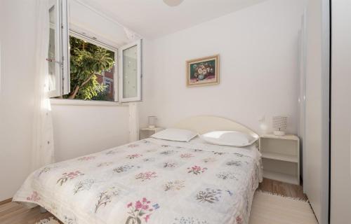 Posteľ alebo postele v izbe v ubytovaní Apartment Tom