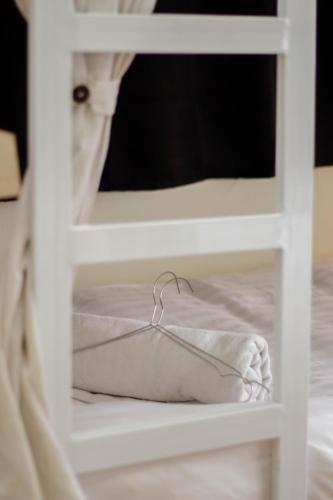 a white bunk bed with a pillow on it at Beds Friends Phi Phi Hostel - Party Hostel in Phi Phi Don