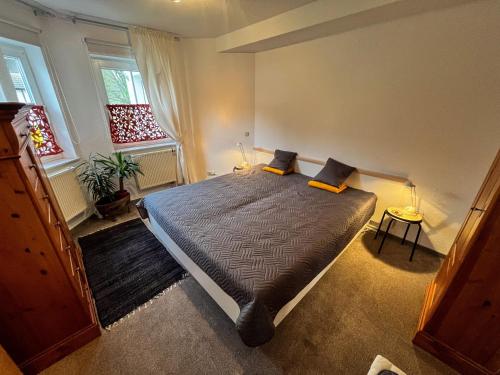 Postel nebo postele na pokoji v ubytování Ferienwohnung Eifel-Nest