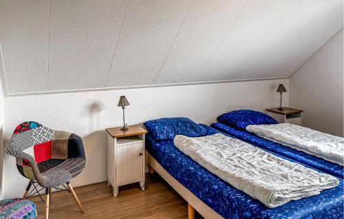 Ένα ή περισσότερα κρεβάτια σε δωμάτιο στο Pet Friendly Home In Makkum With Sauna