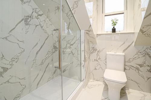 Koupelna v ubytování Beachwalk Apartments by Nova Suites