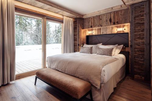 Postel nebo postele na pokoji v ubytování Antarès URSA 001 - luxury apartment ski inski out