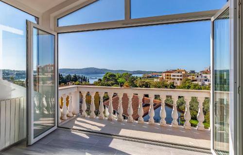 a balcony with a view of the ocean at Nice Apartment In Medulin in Medulin
