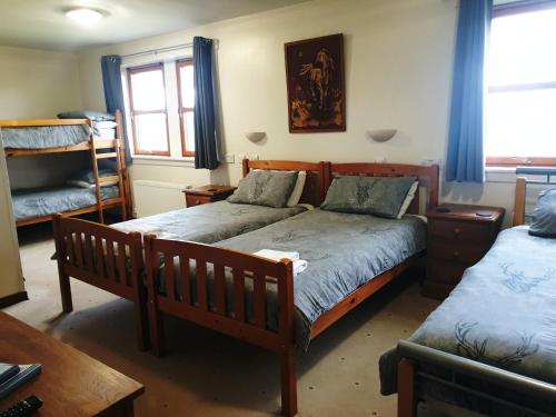 Postel nebo postele na pokoji v ubytování The Loch Erisort