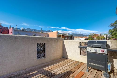 a outdoor grill on a deck on a balcony at Miners Bend - Historic Locale Scenic Workspace in Colorado Springs