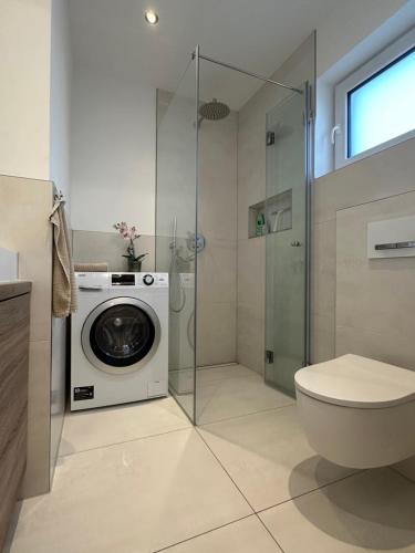 Koupelna v ubytování Modernes deluxe Apartment für 4 Pers in Kaarst Nähe Düsseldorf