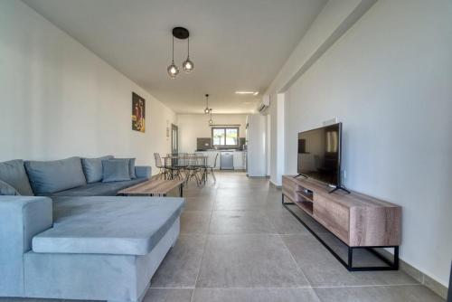 TV a/nebo společenská místnost v ubytování Retreat, block A2, unit 1