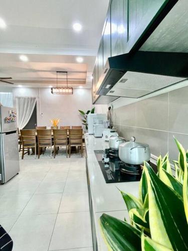 Kuchyň nebo kuchyňský kout v ubytování Ruma10 Homestay