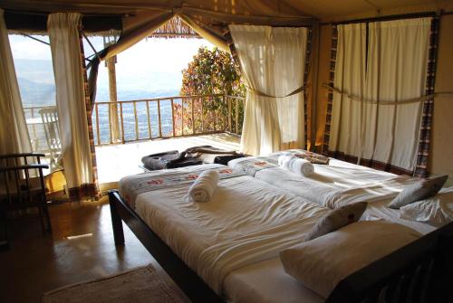 Кровать или кровати в номере Maili Saba Camp