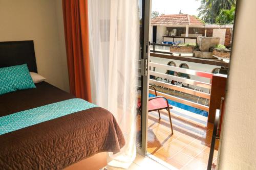 Postel nebo postele na pokoji v ubytování VF Villa Florencia Hotel